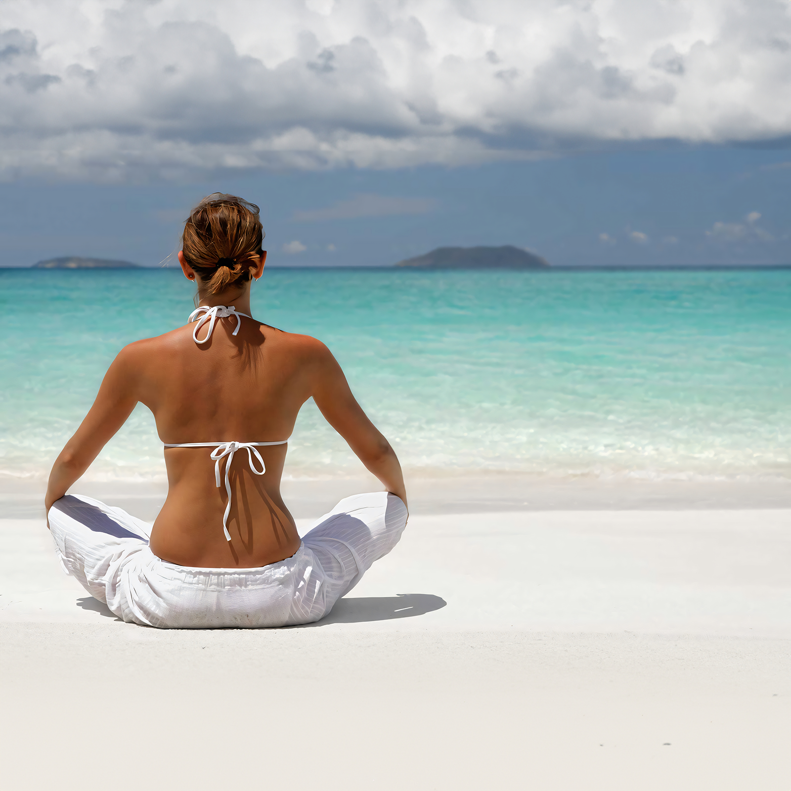 Meditation on the beach — wellness retreat sanctuary
